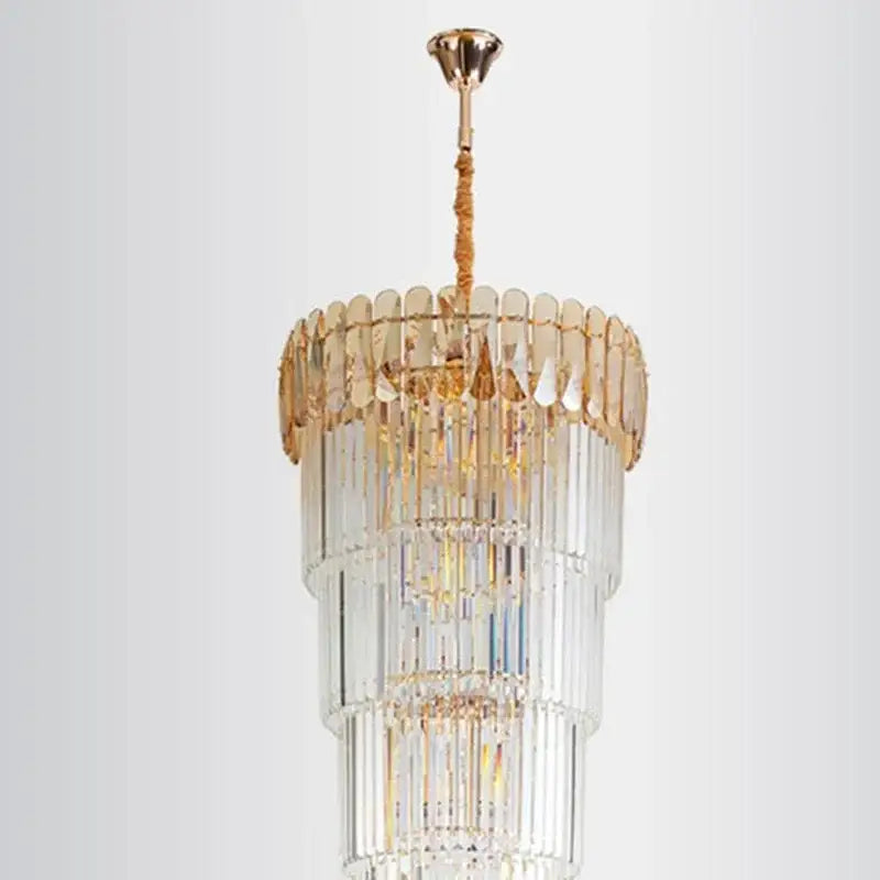 Modern gold crystal led pendant chandelier with tiered clear faceted glass rods and gold-toned metal accents for dining room decorbites crystal led