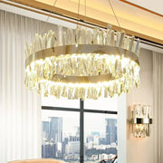 Modern gold crystal led pendant chandelier with a circular metal frame and cascading prisms for dining room decorbites crystal led
