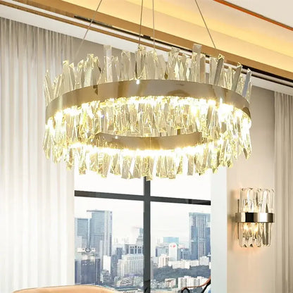 Modern gold crystal led pendant chandelier with a circular metal frame and cascading prisms for dining room decorbites crystal led