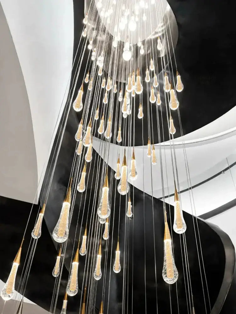 Modern gold crystal led pendant chandelier with teardrop glass pendants and gold caps for living room decorbites crystal led