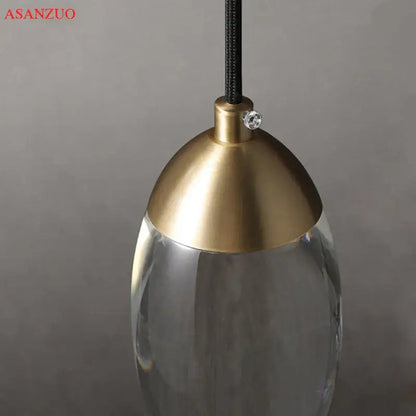 Modern gold crystal led pendant light with polished brass dome top and clear glass body for stylish decorbites crystal led decor