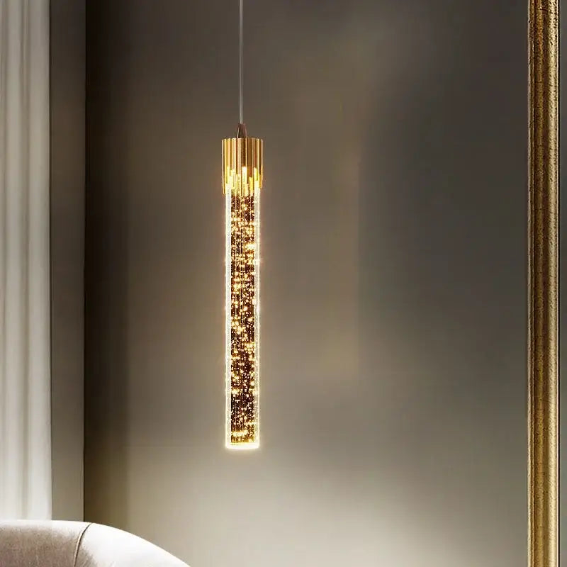 Modern gold crystal led pendant light with a sparkling glitter-filled interior and sleek metallic top decorbites crystal led pendant