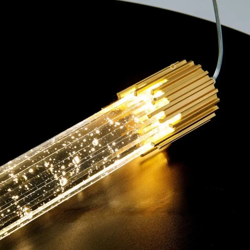 Modern gold crystal led pendant light with bubble-filled glass and warm internal led glow for living room decorbites crystal led