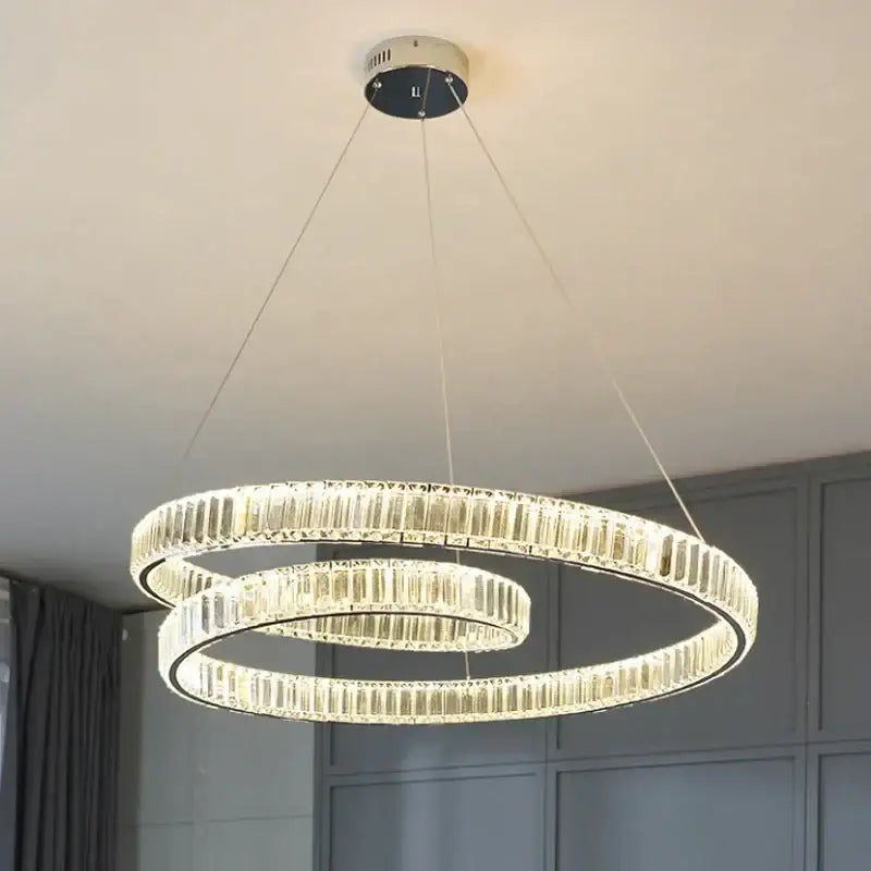 Modern double-ring crystal led pendant with clear faceted crystals and sleek chrome finish for dining room decorbites crystal led