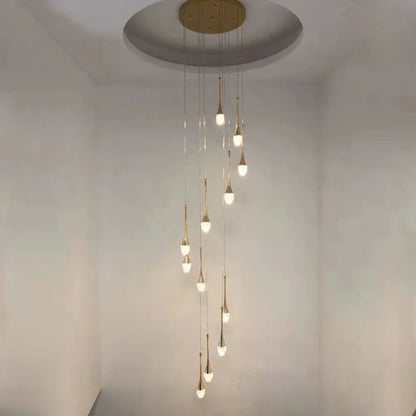 A modern gold crystal led staircase chandelier with multiple teardrop lights for living room decorbites crystal led