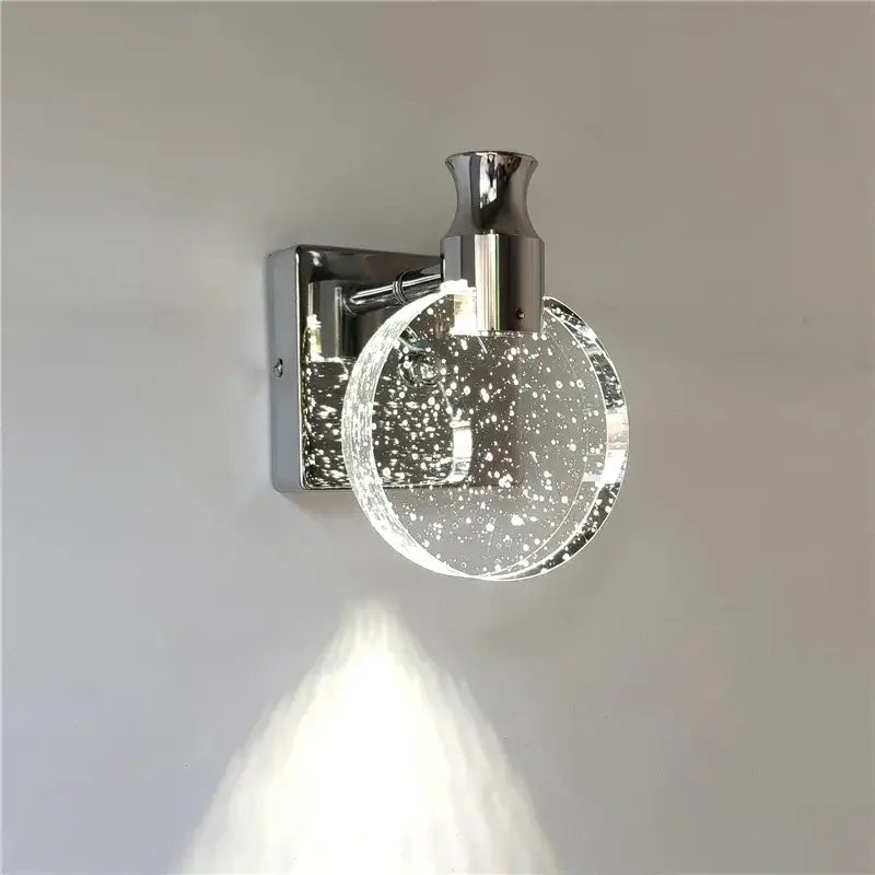 Modern gold crystal led wall lamp featuring a chrome finish and clear glass globe with sparkling decorbites crystal led particles