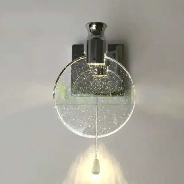 Modern chrome-finished wall lamp with circular glass diffuser embedded with glitter and elegant pull chain switch decorbites crystal led wall