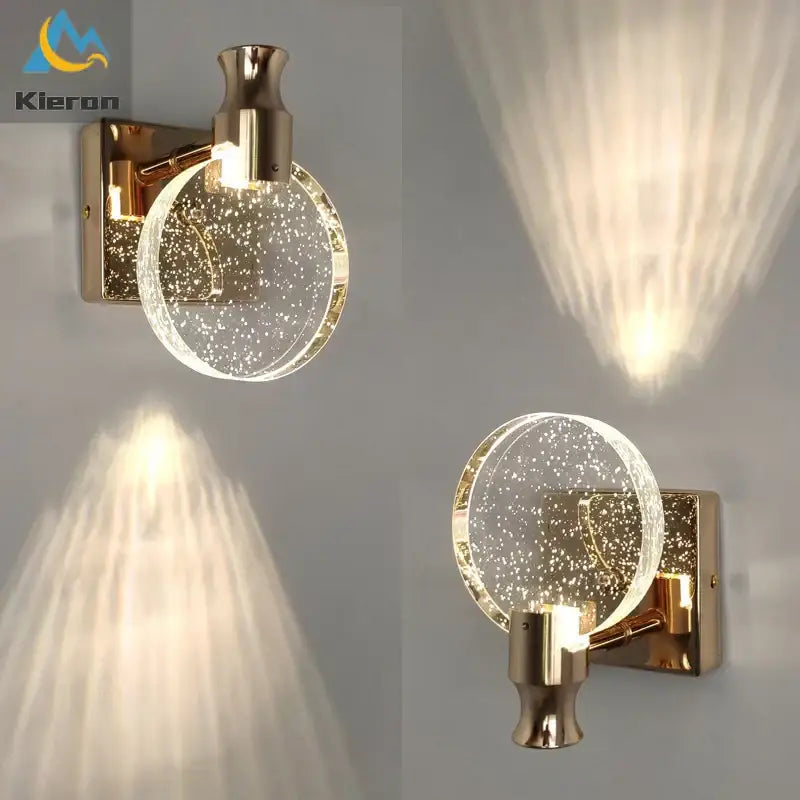 Modern gold-toned wall lamp with a crystal led glass globe filled with sparkling particles for elegant bedroom decorbites crystal led wall