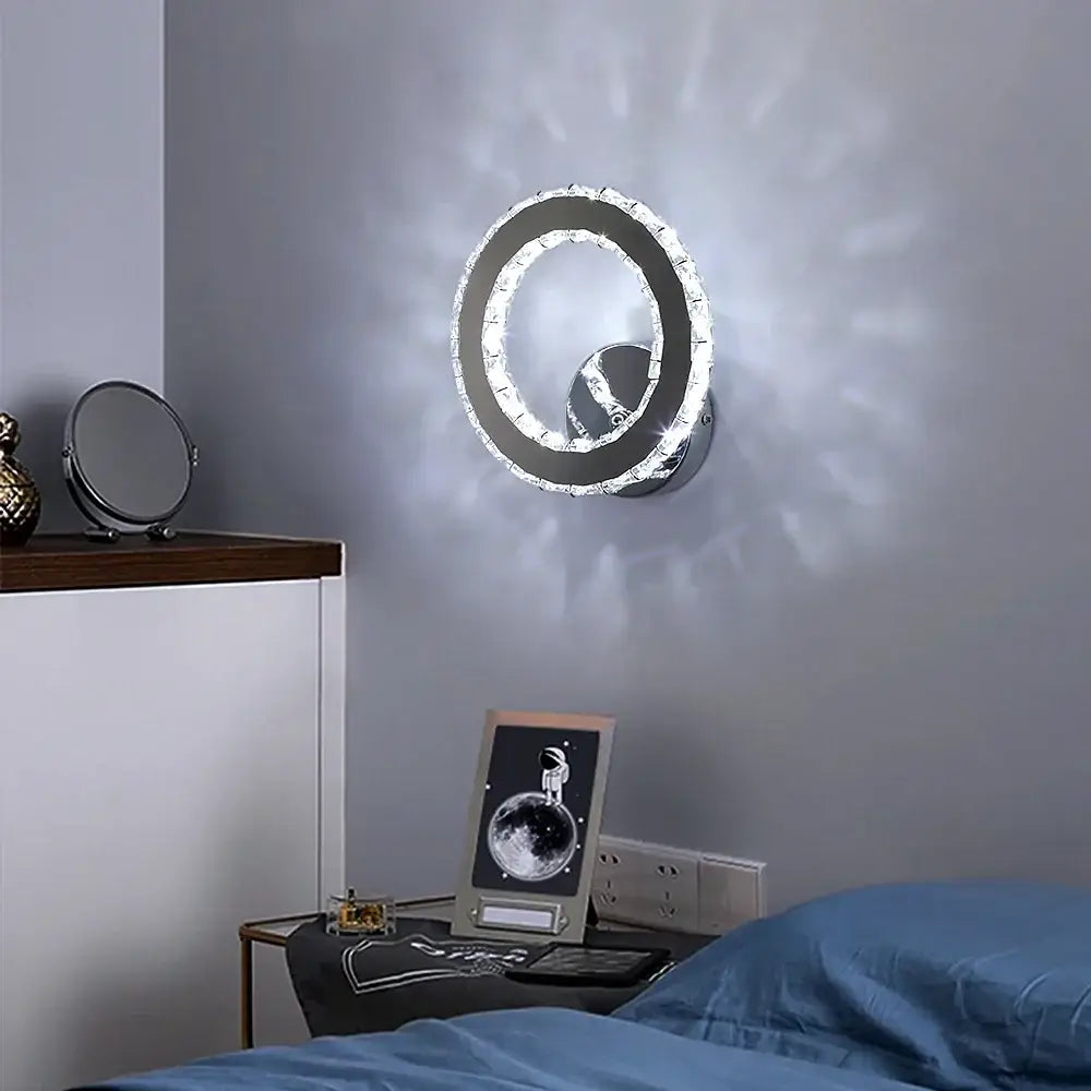 Modern gold crystal led wall lamp with sleek chrome finish and embedded leds creating radiant decorbites crystal led effect
