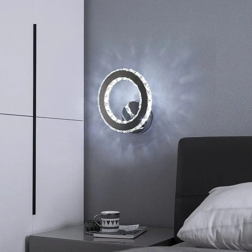 Modern gold crystal led wall lamp with chrome finish and crystal accents emitting soft white light for bedroom decorbites crystal led