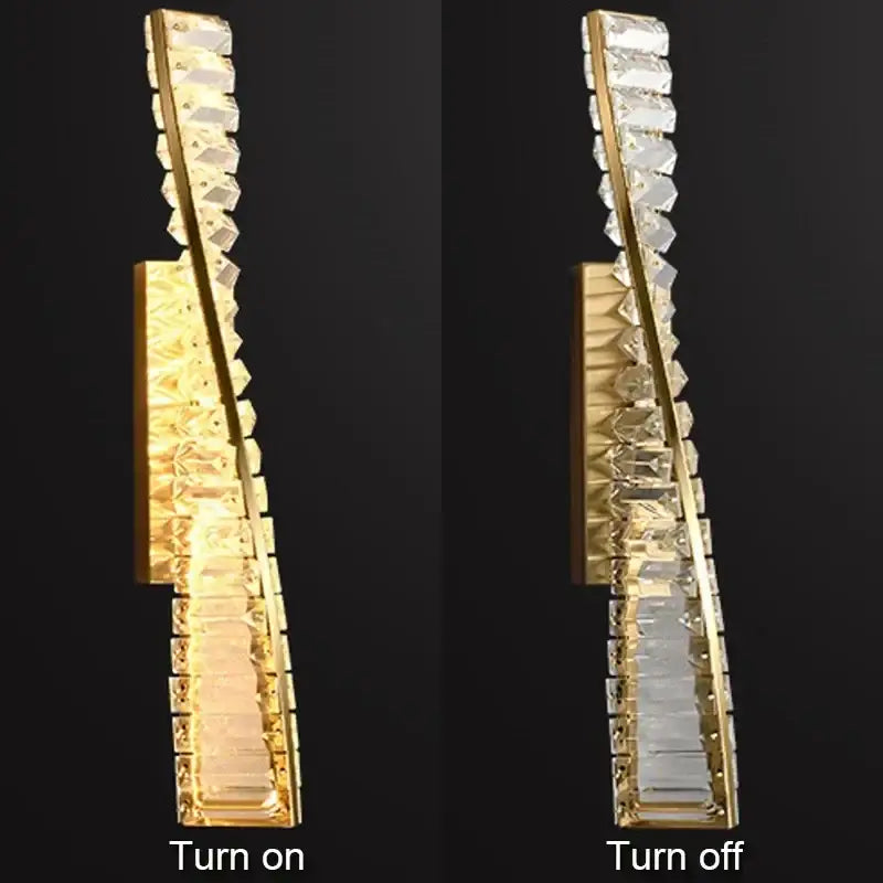 Modern gold crystal led wall lamp with sleek curved design and clear crystal facets for luxury bedroom lighting decorbites crystal led