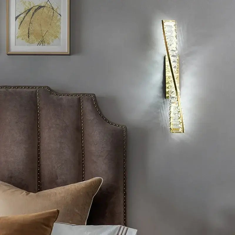Modern gold crystal led wall lamp with sleek curved design and embedded crystal led for luxury bedroom lighting decorbites wall lamp