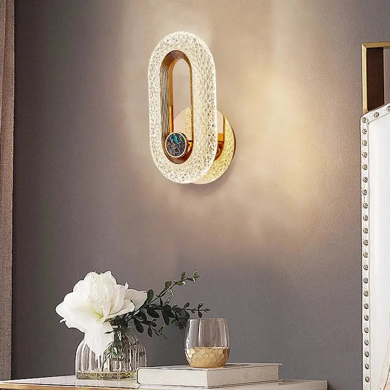 Modern gold crystal led wall lamp with oval frame and blue-green accent stone for living room sconce lighting