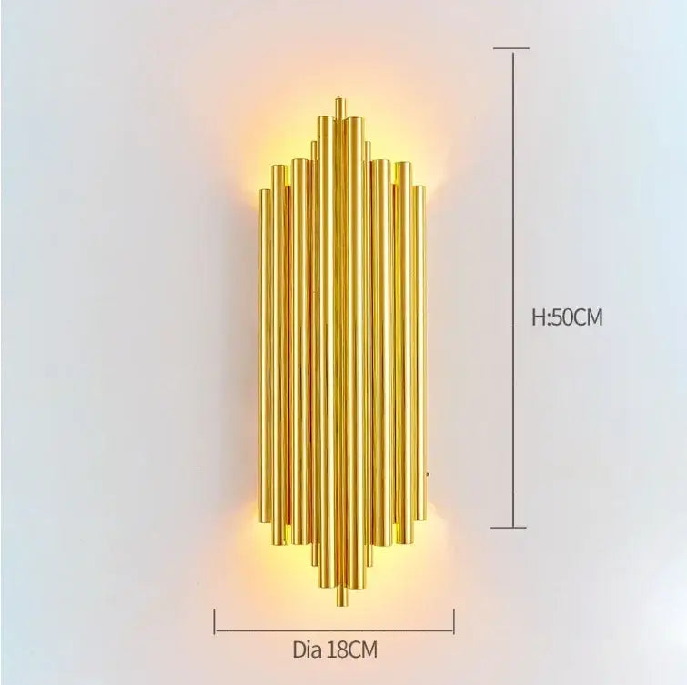 Modern gold-toned led wall lamps featuring vertical cylindrical rods in a symmetrical cascading design for bedroom use