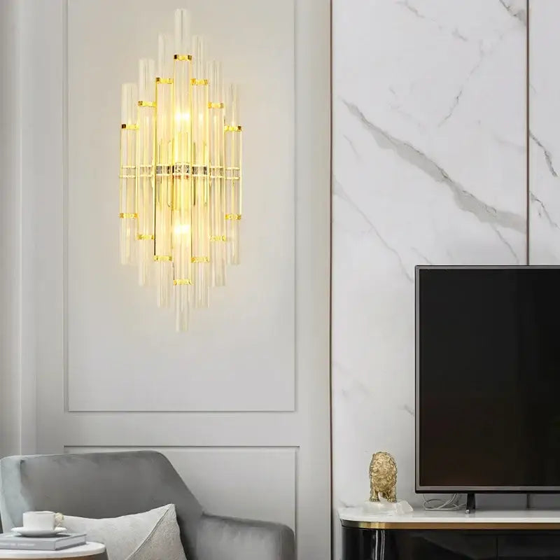 Modern gold crystal led wall lamps featuring vertical glass rods and an elegant cascading sconce design for bedrooms