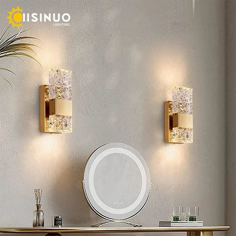 Modern gold crystal led wall light with faceted glass panels emitting warm light for bedroom decorbites crystal led sconce