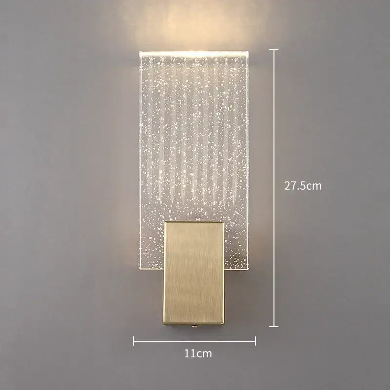Modern gold crystal led wall sconce with rectangular acrylic panel and brushed gold base for bedroom lighting