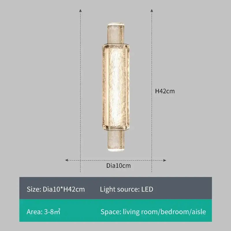 Modern gold crystal led wall sconce featuring a textured gold metal body and frosted glass diffuser for bedroom lighting