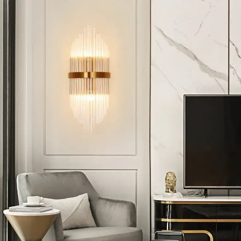 Modern gold crystal led wall sconce with vertical glass rods radiating light for bedroom use elegant led wall lighting