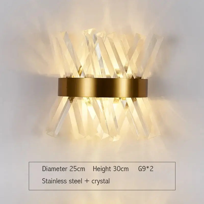 Modern gold stainless steel led wall sconce with clear crystal rods in an angular radiating design for bedroom lighting