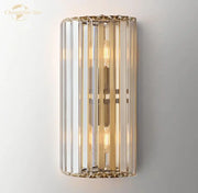 Modern gold crystal led wall sconce with vertical crystal rods and filament bulbs for bedroom lighting decorbites crystal led