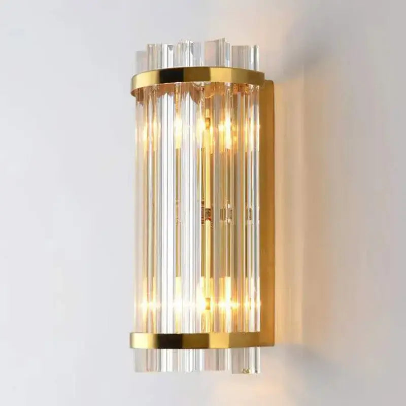 Elegant modern gold wall lamp with vertical crystal rods showcasing decorbites crystal luxury for bedroom sconce decor