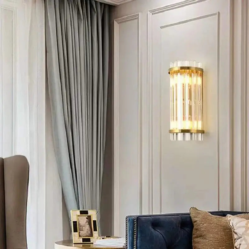 Modern gold crystal luxury wall lamp featuring vertical crystal rods for elegant bedroom decorbites crystal luxury wall decor