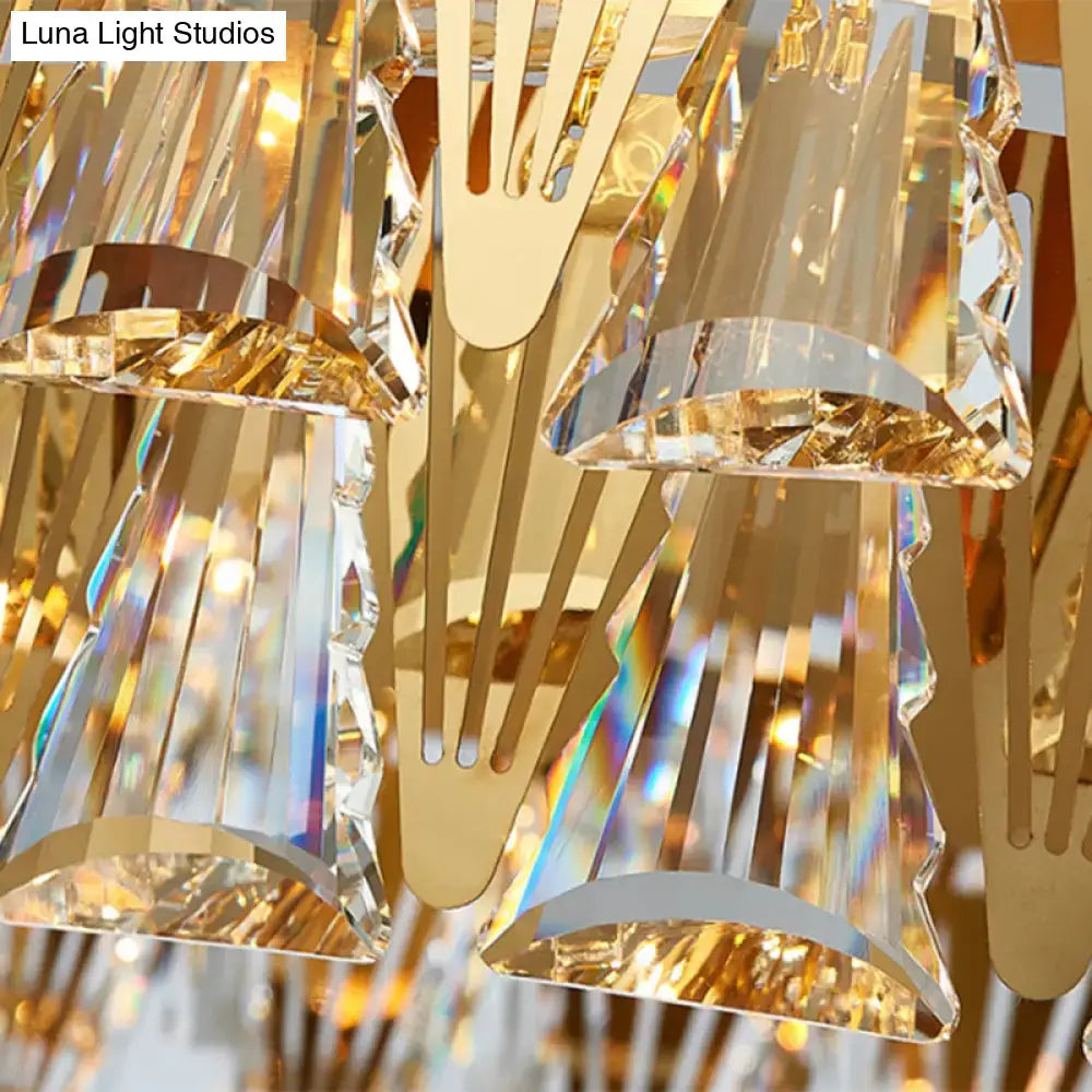 DecorBites gold crystal chandelier with faceted prisms and metal arms for elegant oval dining room lighting