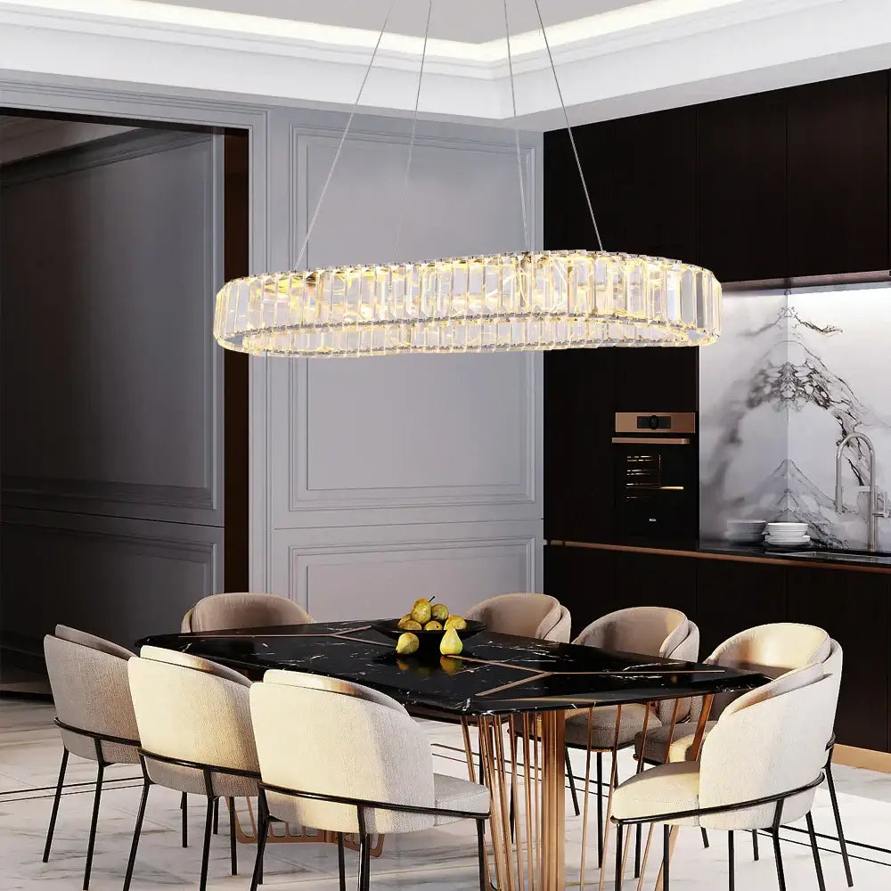 A modern gold crystal oval led chandelier with clear rods and warm glow perfect for living room decorbites crystal oval