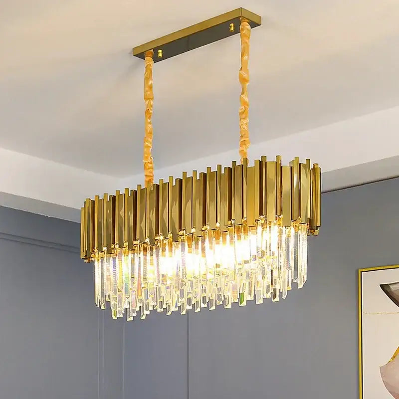 Modern gold crystal oval round chandelier with gold-toned brass bars and clear crystal prisms for dining room decorbites crystal oval