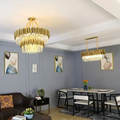 Modern gold crystal oval round chandelier with gold-toned frame and cascading crystal tiers for dining room decorbites crystal oval