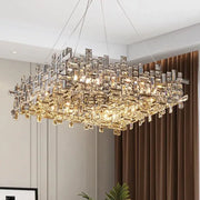 Modern gold crystal pendant chandelier with clear and gold-toned prisms for dining room decorbites crystal pendant