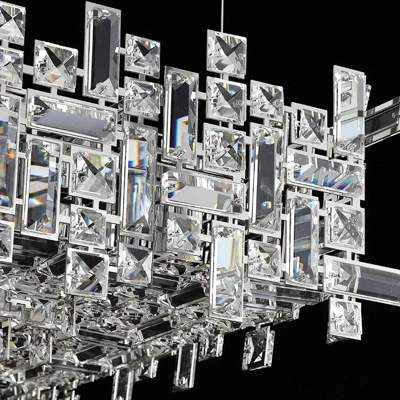 A modern gold crystal pendant chandelier with polished silver frame and faceted crystals for dining room decorbites crystal pendant