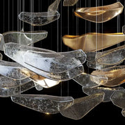 Modern gold crystal pendant chandelier featuring translucent crackled glass and polished gold leaf for dining room decorbites crystal pendant
