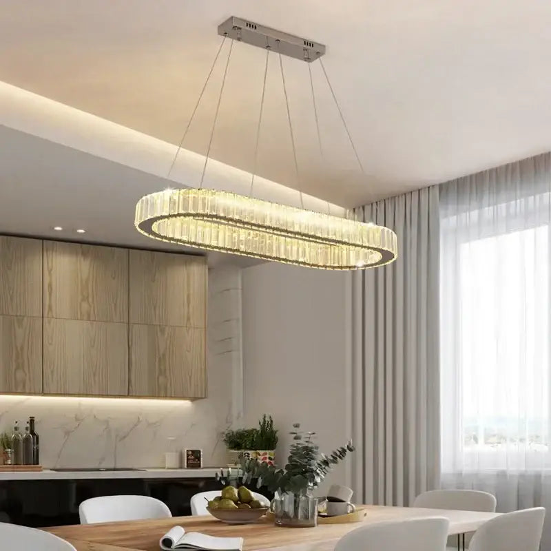 Modern gold crystal pendant chandelier with sleek metallic frame and cascading rods for dining room decorbites crystal pendant
