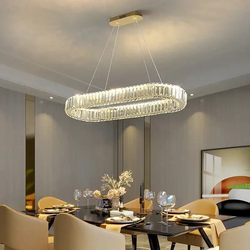 Modern gold crystal pendant chandelier with oval shape and clear rods by decorbites for dining room decorbites crystal pendant