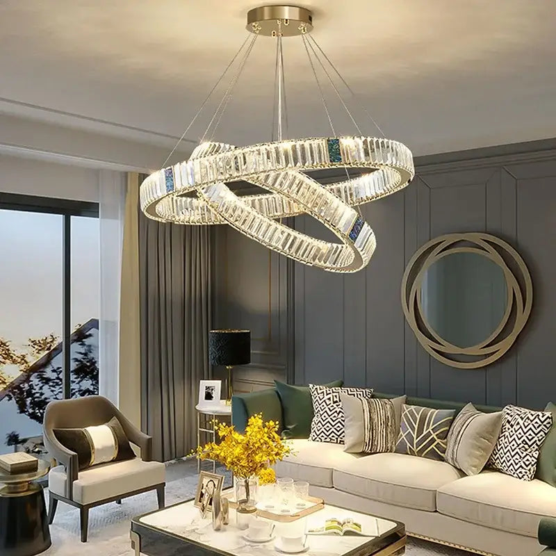 Modern gold crystal pendant chandelier led dining room light with clear crystal segments and blue accents from decorbites crystal pendant