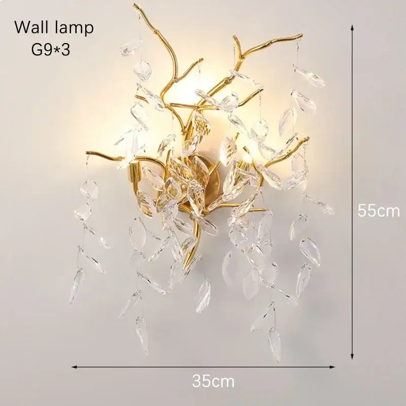 Modern gold crystal pendant chandelier with gold-toned branch design and dangling clear crystal leaves for luxury decorbites decor