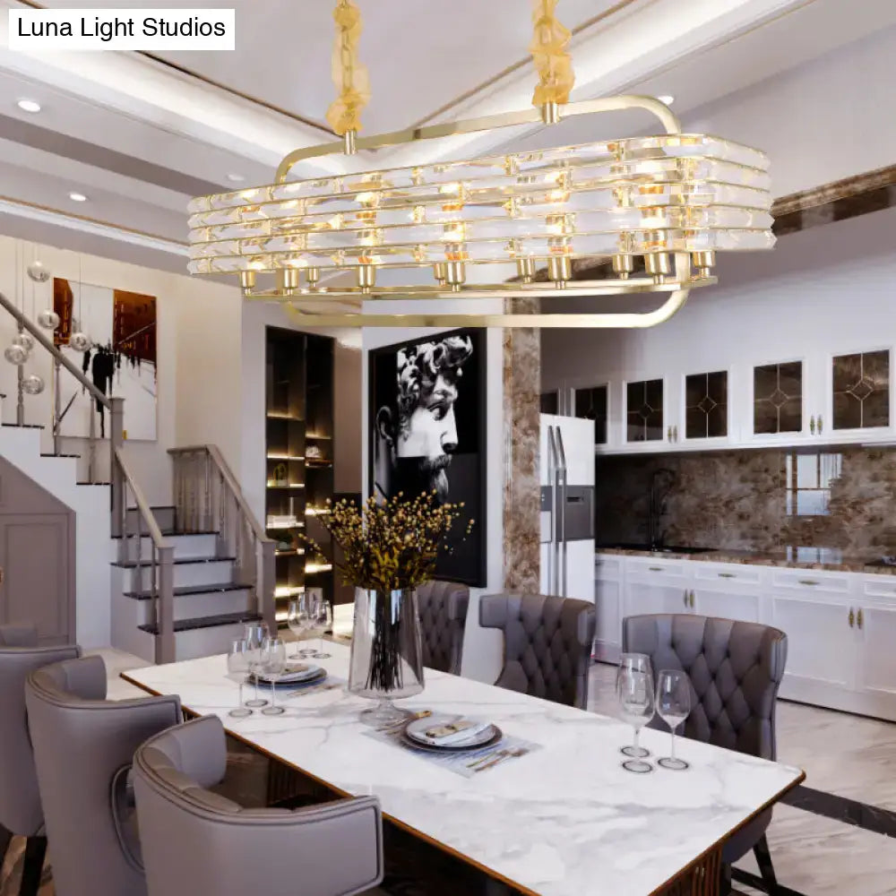 DecorBites™ modern gold crystal pendant light fixture with 8 heads and layered accents above dining table