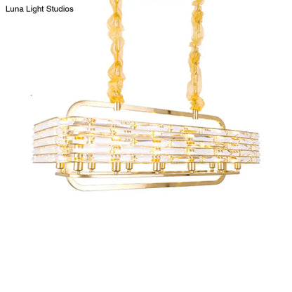 DecorBites modern gold crystal pendant light fixture with 8 heads featuring stacked clear crystals and twisted amber chains