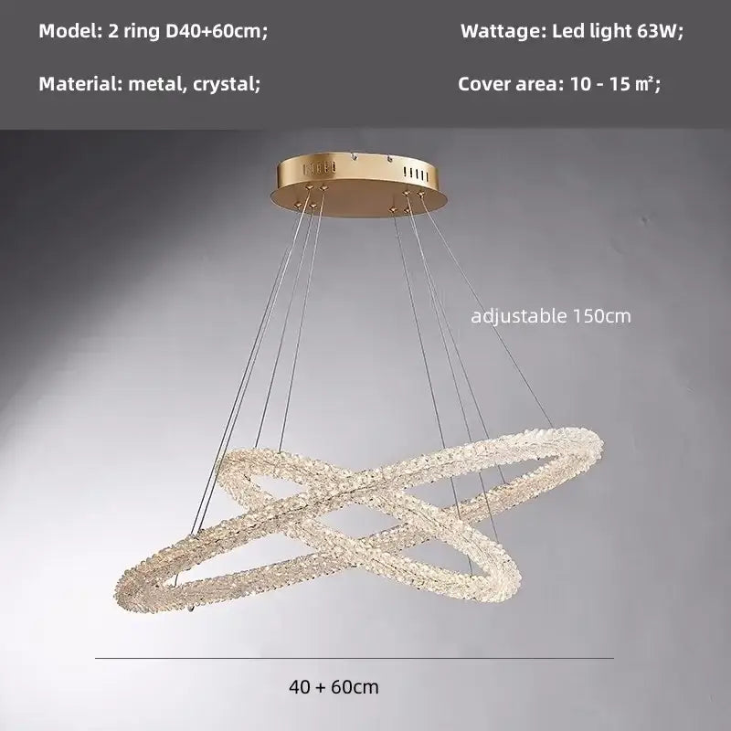 Modern gold crystal pendant lights featuring a gold-toned metal and crystal double-ring design with adjustable length chandelier