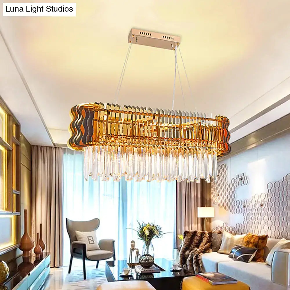 Decorbites modern crystal prism island pendant with gold finish featuring clear rectangular crystal and six bulbs