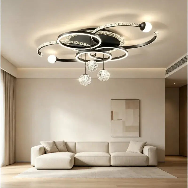 Modern black crystal-encrusted circular pendant light with dimmable led bulbs and dangling glass orbs for dining room