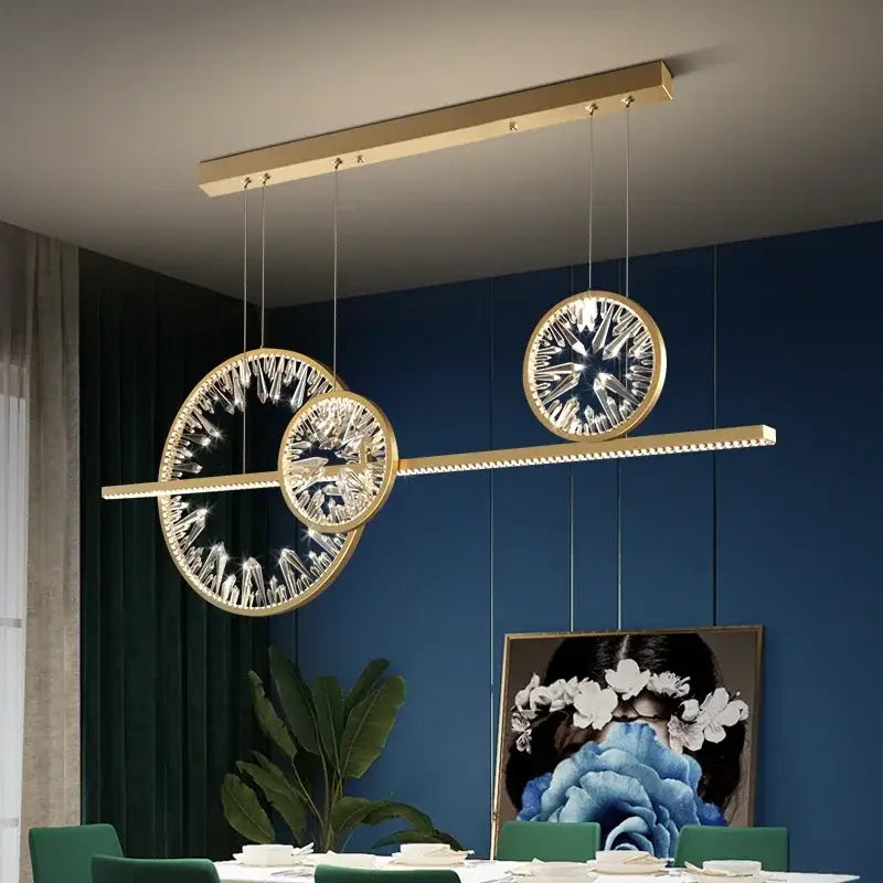 Modern gold crystal ring chandelier with three circular crystal-encrusted light fixtures for living room pendant lighting