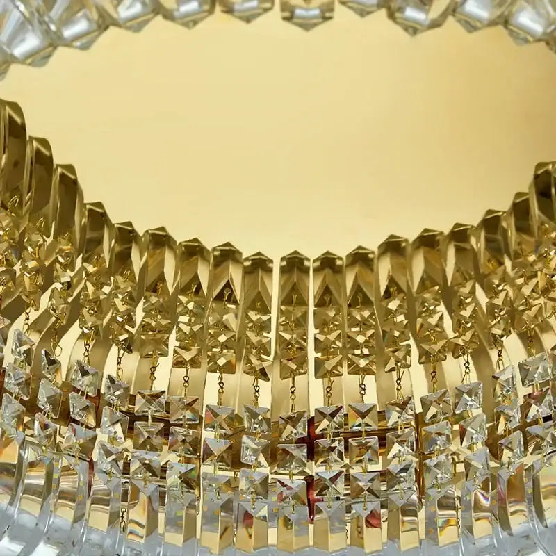 Modern gold crystal ring led ceiling lamp featuring a luxurious gold-toned chandelier with cascading crystal prisms