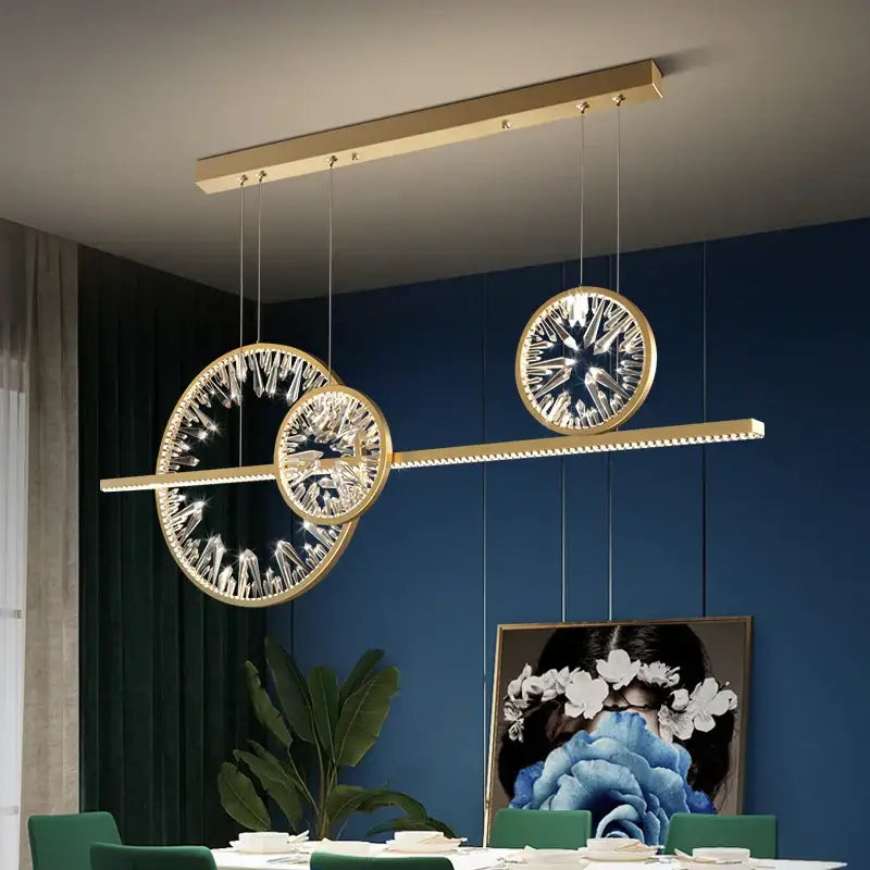 Modern gold crystal ring led chandelier with crystal-encrusted circular elements and sleek linear bar design for dining room decorbites crystal ring