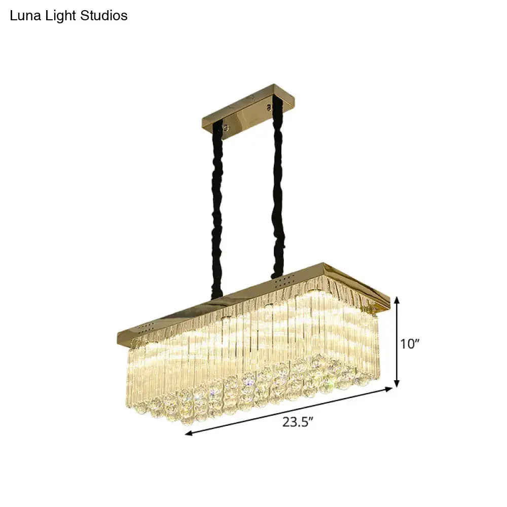 Gold-finished rectangular chandelier with crystal rod prisms and black twisted cords for dining room warm white lighting