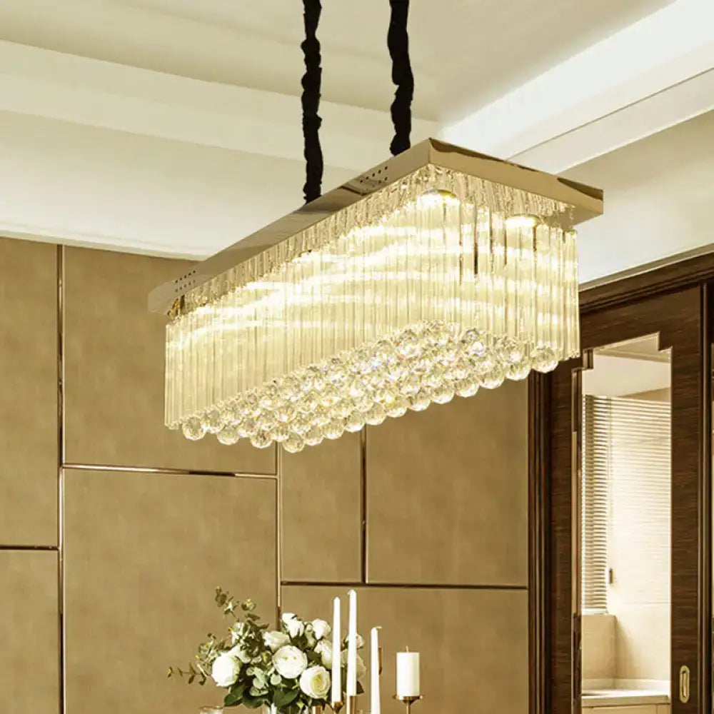 DecorBites™ LED gold suspension crystal rod island light with sleek metallic frame and warm white prisms for dining room