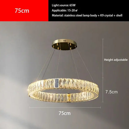 Modern gold crystal round ceiling chandelier with stainless steel body k9 crystal accents and adjustable height decorbites crystal round