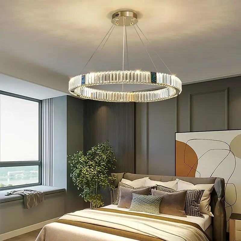 Modern gold crystal round ceiling chandelier with clear crystal rods and gold-toned metal for dining room decorbites crystal round
